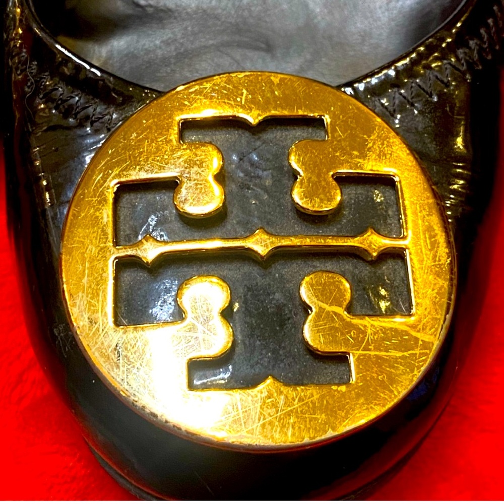 Tory Burch gold emblem gold trim heel